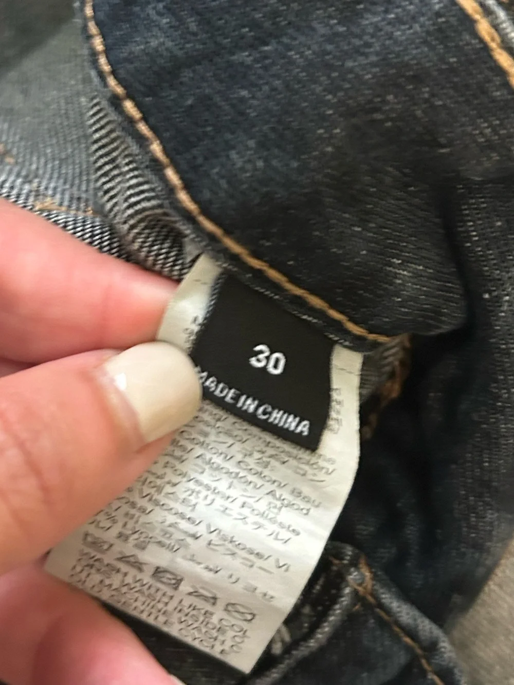 CHANEL Dark Blue Denim Jeans with Gold Chain Trim